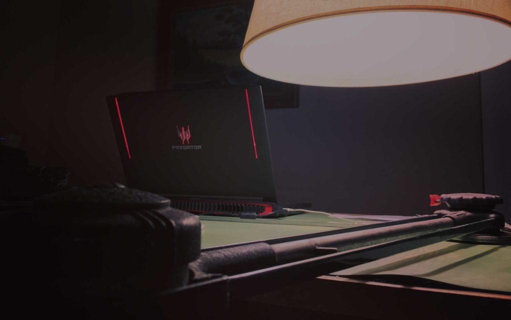 Large laptop sitting on fradting table